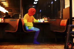 Rainbow Man After Hours - Yarnography - Colorful Characters in Crochet Art by Gina Gallina - Photography Concepts by Jeremy Mason McGraw