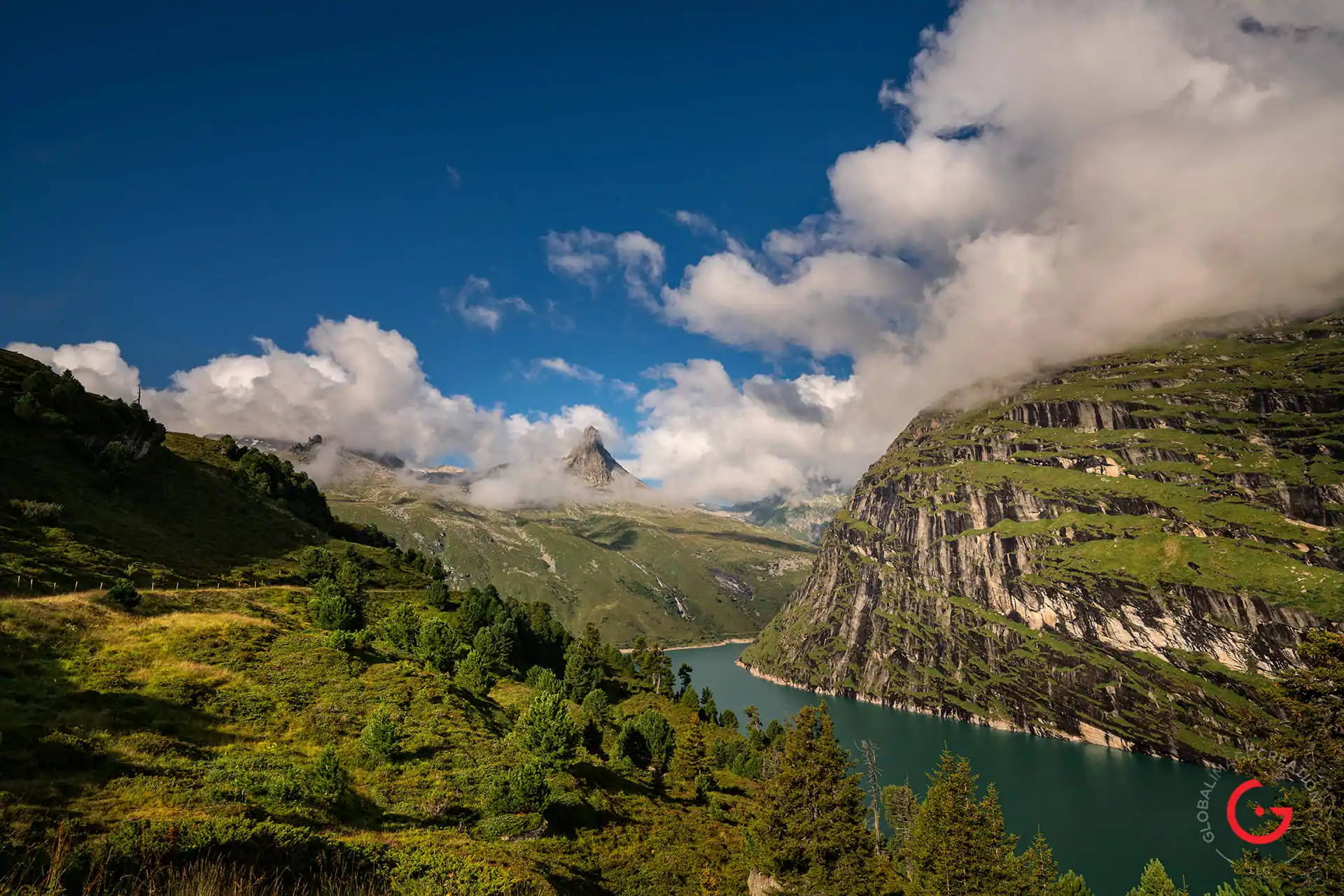 Travel Photography of a Beautiful View of the Swiss Mountains over the lake Near Zervreilasee Dam