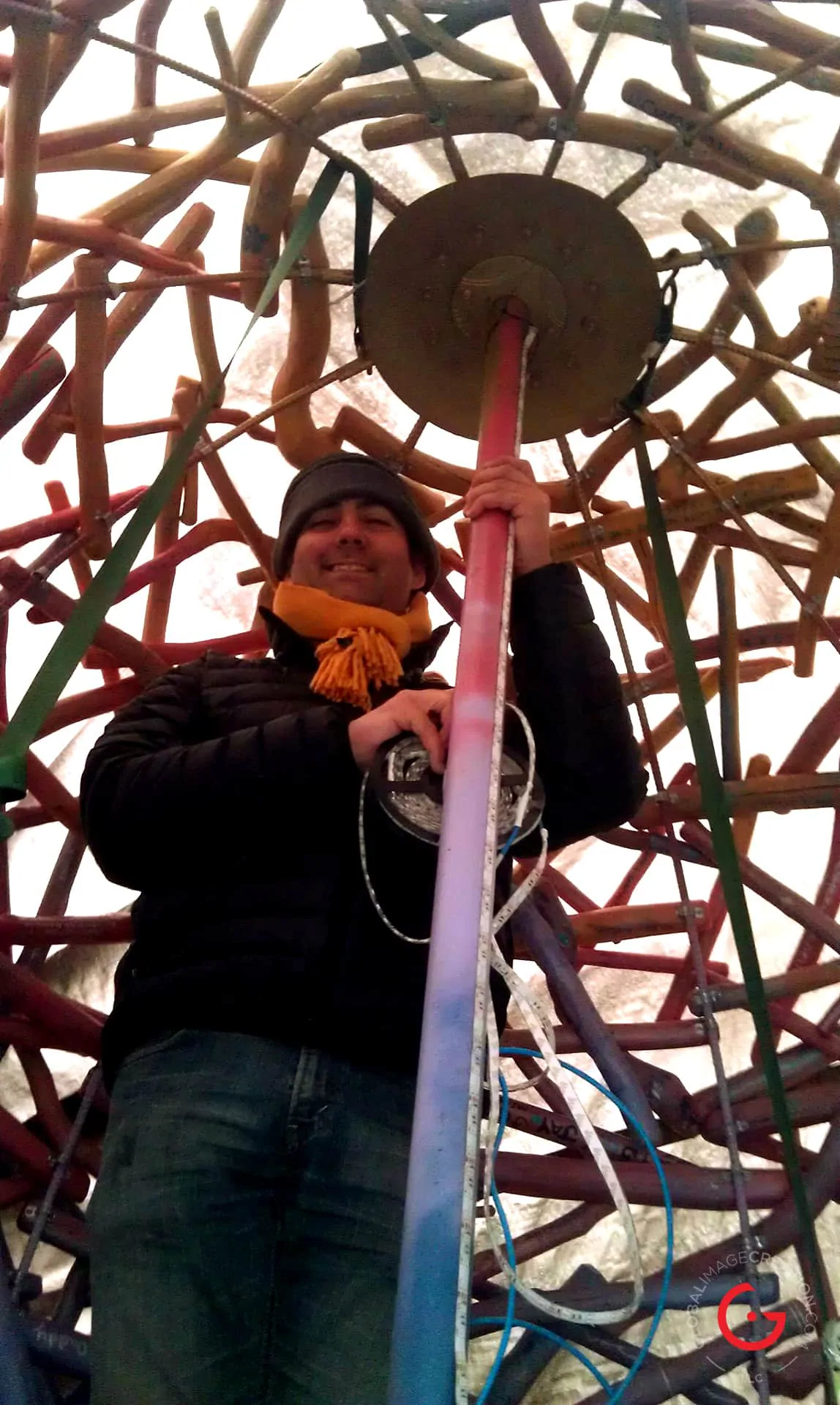 Jeremy Mason McGraw Wiring up The LED Lighting Inside of The Snow Covered Sphere Sculpture