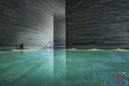 Woman has a Moment of Solace in the 7132 Hotel Therme by Peter Zumthor - Professional Photographer Lifestyle Photography Wardrobe Stylist