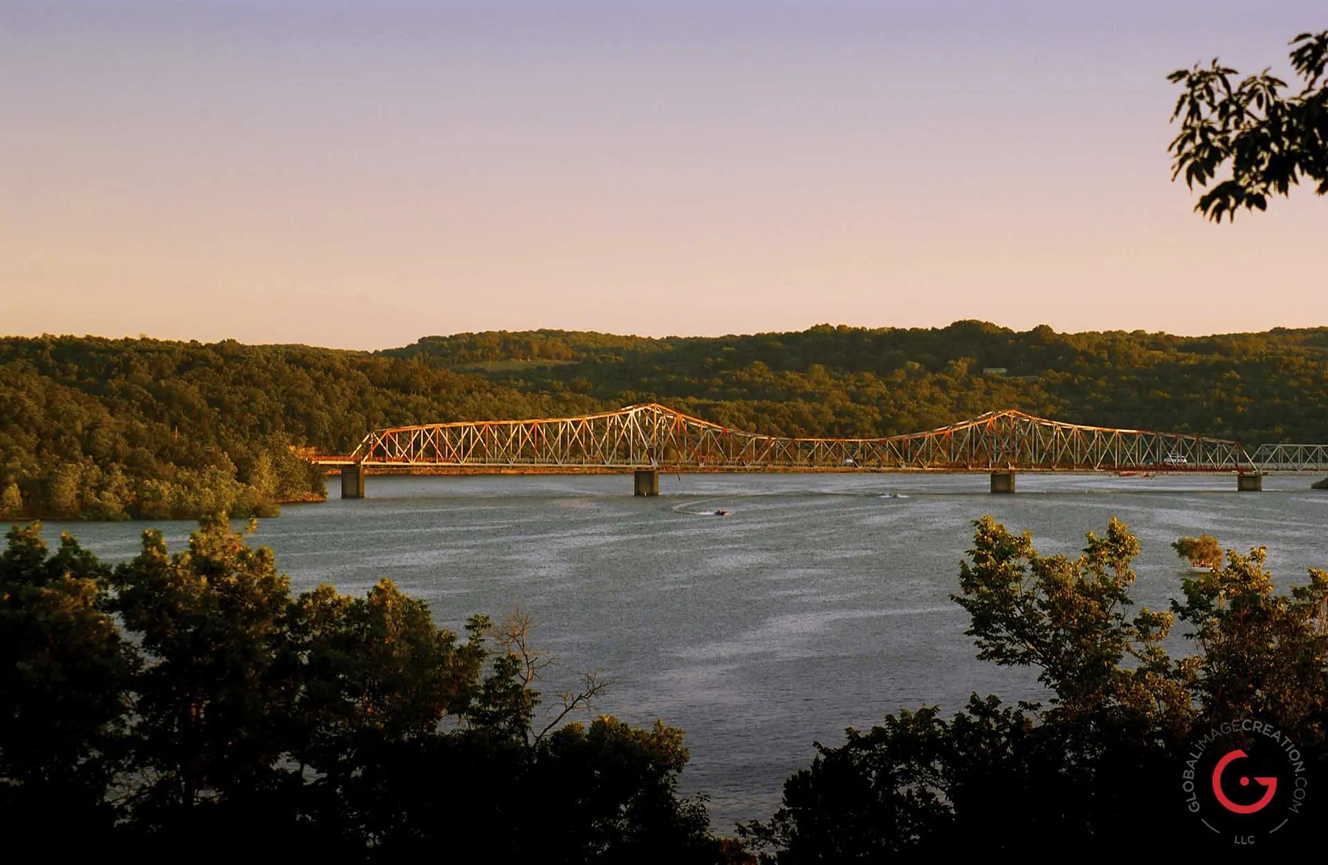 Sun sets on hwy 86 Bridge over table rock lake. - Advertising photographers in Branson Missouri, Branson Missouri photography